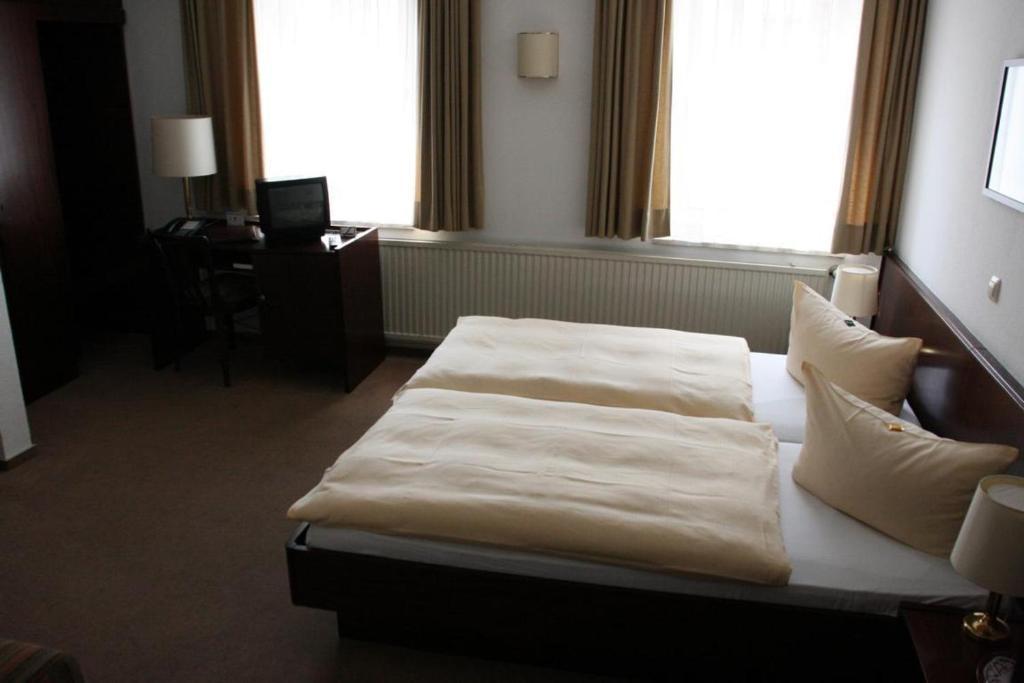 Hotel Diening Essen Pokoj fotografie